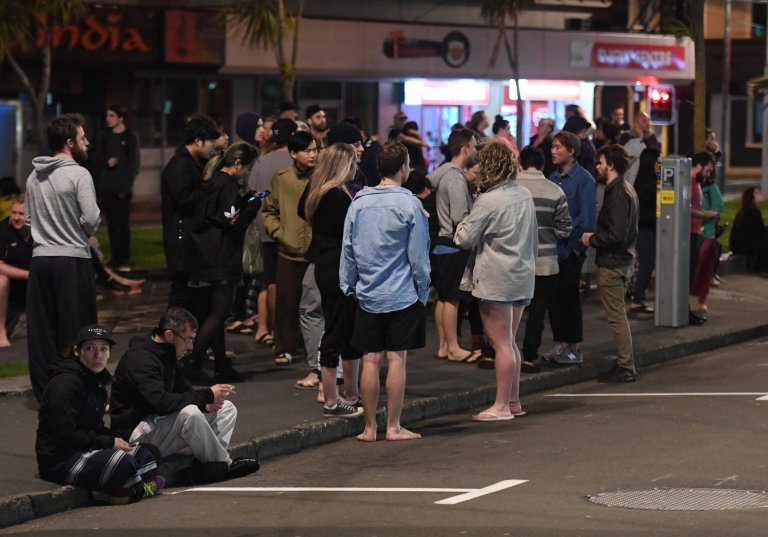 epa05629748 People evacuated from buildings along Dixon Street, Wellington after an earthquake based around Cheviot in the South island shock the capital, New Zealand, early 14 November 2016. According to reports, a 7.4. earthqauke has hit New Zealand overnight, triggering a tsunami warning for the east coast of the country.  EPA/ROSS SETFORD