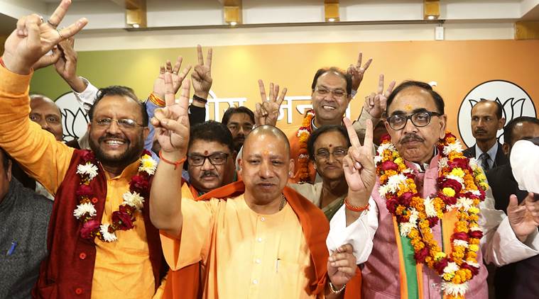 Uttar Pradesh Chief Minister Yogi Adityanath along with BJP state President Mahenra Narth Pandey and other party leaders celebrating victory in Urban,Local body elections at state party head office in Lucknow on friday.Express photo by Vishal Srivastav 01.12.2017