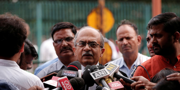 Prashant Bhushan, a senior lawyer, speaks with the media after a verdict on right to privacy outside the Supreme Court in New Delhi, India August 24, 2017. REUTERS/Adnan Abidi