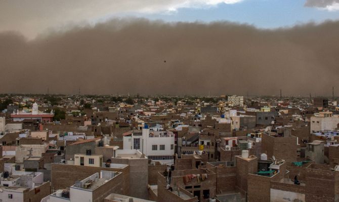 Bikaner: A dust storm approaches the city of Bikaner on Wednesday. PTI Photo (PTI5_2_2018_000173B)