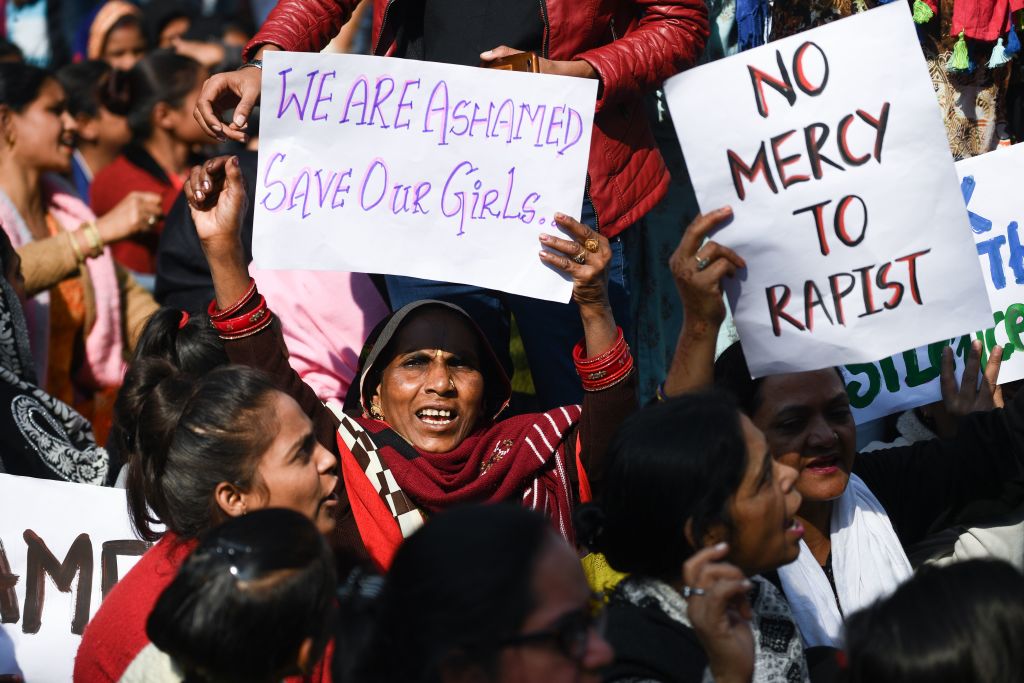 Social activists and supporters shout slogans to protest against the alleged rape and murder of a 27-year-old veterinary doctor in Hyderabad, during a demonstration in New Delhi on December 3, 2019. (Photo by Sajjad  HUSSAIN / AFP) (Photo by SAJJAD  HUSSAIN/AFP via Getty Images)