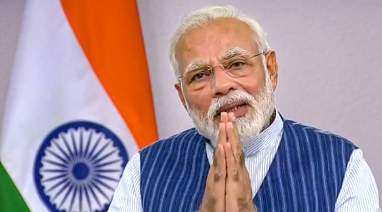 **EDS: VIDEO GRAB** New Delhi: Prime Minister Modi interacts with citizens of Varanasi amid nationwide lockdown, in the wake of coronavirus outbreak, via video conferencing, in New Delhi, Wednesday, March 25, 2020. (DD NEWS/PTI Photo)(PTI25-03-2020_000221B)