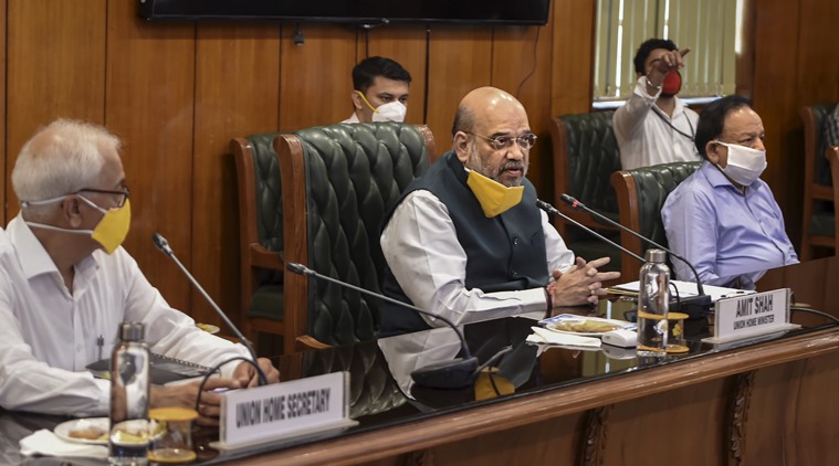 New Delhi: Union Home Minister Amit Shah with Health Minister Harsh Vardhan (2nd R) and senior officers holds a meeting to discuss the COVID-19 situation in Delhi, at North Block in New Delhi, Sunday, June 14, 2020. The meeting comes in the wake of increasing number of coronavirus cases in Delhi, where the tally has reached nearly 39,000 cases and the death toll rose to over 1,200. (PTI Photo/ Shahbaz Khan) (PTI14-06-2020_000037B)
