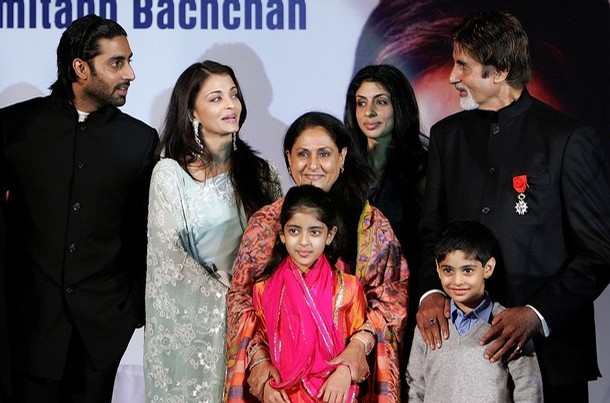 (FILES) In this file photo taken, 27 January 2007, Indian film actor Amitabh Bachchan (R) poses with his wife Jaya Bachchan (C), son Abhishek Bachchan (L), soon to be daughter-in-law Aishwarya Rai (2-L) and daughter Shweta Nanda during a function at the French Embassy in New Delhi, after recieving the Legion d'Honneur. As stated in a report released, 24 March 2007, Bollywood superstar Amitabh Bachchan has denied reports that his family performed Hindu religious ceremonies to lift a curse from Bollywood actress Aishwarya Rai who is engaged to marry his son. AFP PHOTO/Manan VATSYAYANA (Photo credit should read MANAN VATSYAYANA/AFP/Getty Images)